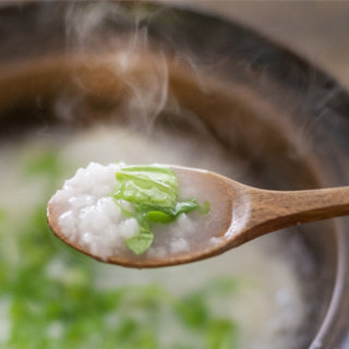 What is Nanakusa gayu (rice porridge with seven herbs) ?